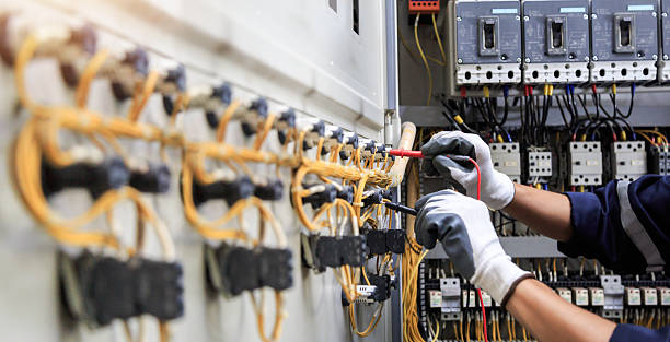 Professional Electrician technician working in Many, LA